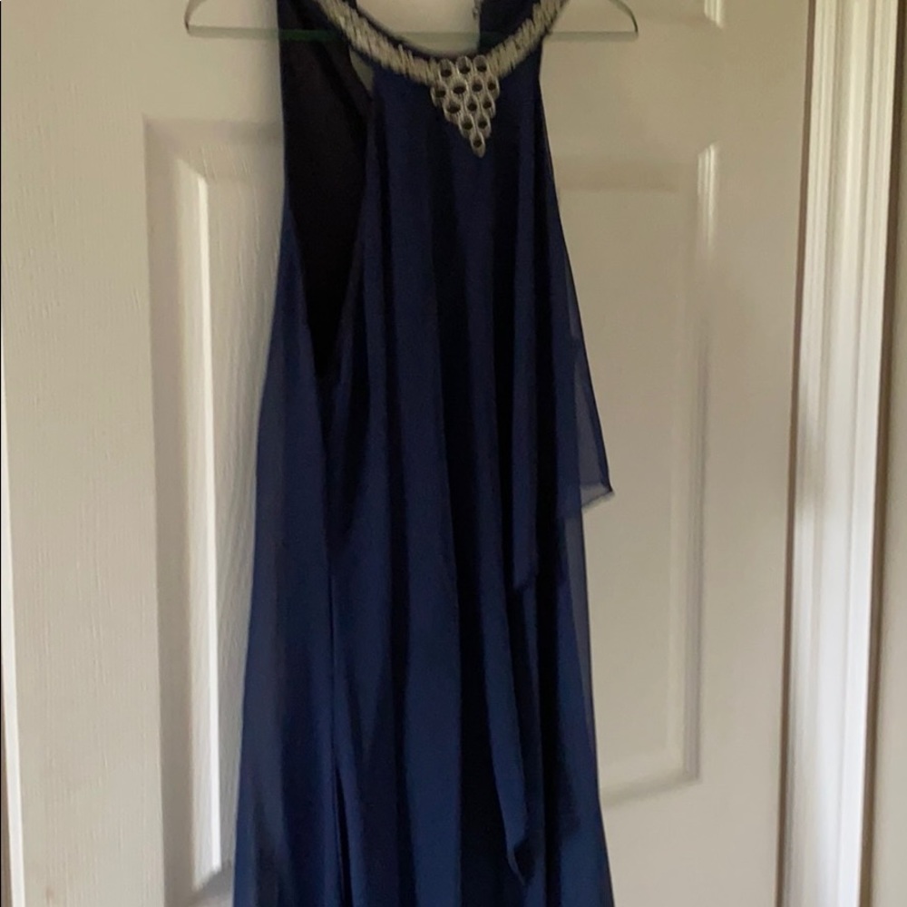 Navy layered evening dress with jewelled neckline